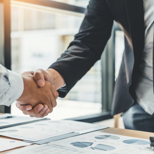 Business people colleagues shaking hands meting Planning Strategy Analysis Concept